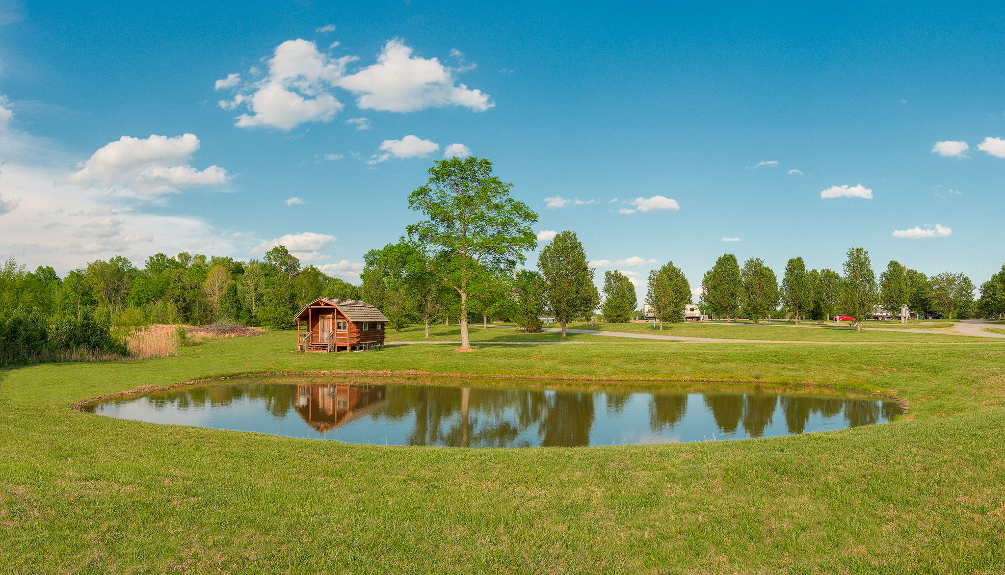 Cabin by Pond for family camping experience