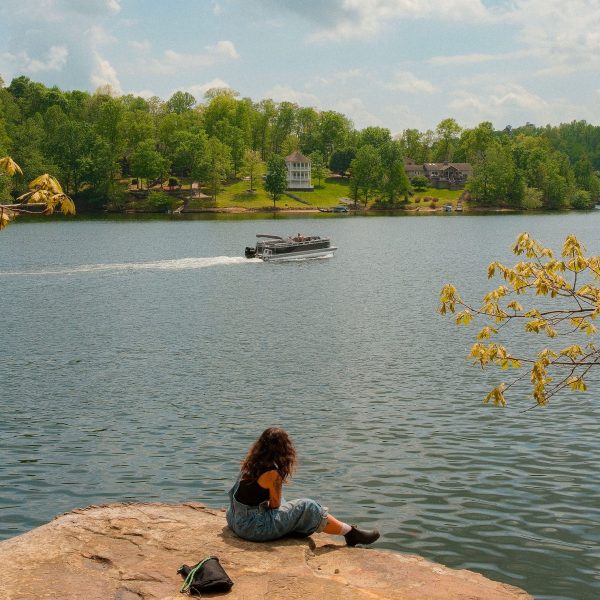 Girl Watching boat on Lake Malone